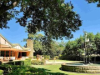 Building with water fountain out the front
